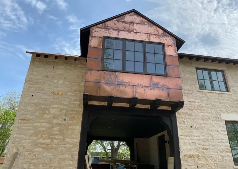 Copper metal panel facade on a stone building for Metal Roof Coating in Kinderhook